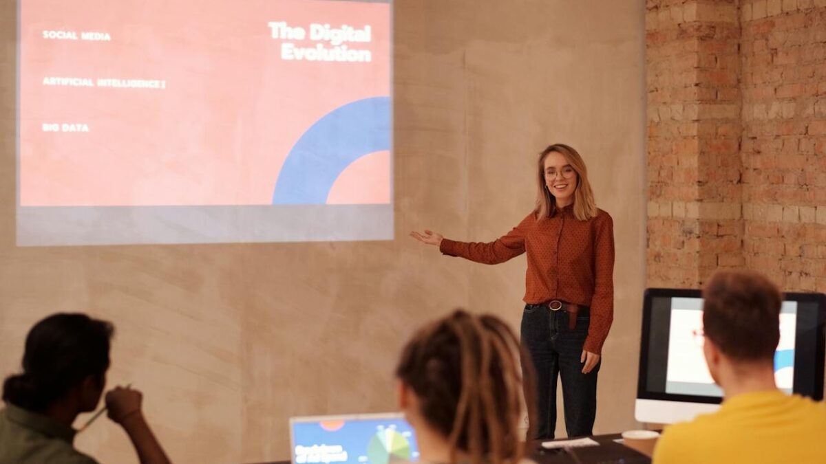 a woman standing delivering a workplace presentation whilst consciously thinking to improve posture to look taller